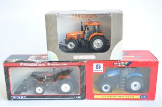 Three 1/32 diecast tractor model s to include Britain's 42112 New Holland T8040, Universal Hobbies