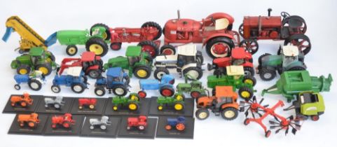 Collection of previously displayed tractor and farming machinery models, diecast and plastic,