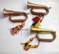 Three Military brass and copper bugles decorated with rope 'colours'. Sutherland and Argyll, Royal