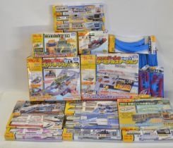 Collection of boxed Japanese Imported Takara Tomy/PlaRail battery operated plastic model train