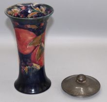 Moorcroft Pottery - pomegranate pattern vase of waisted form, H21cm, and a pewter cover stamped