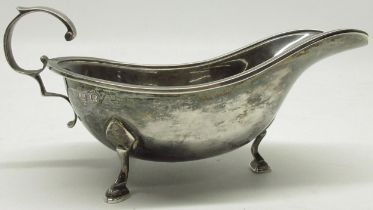 Geo.V Silver sauce boat with c-scroll handle on three hoof feet, Chester, 1934, S Blanckensee &