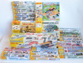 Collection of boxed Japanese imported Takara Tomy/PlaRail battery operated plastic model train
