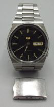 Seiko 5 stainless steel automatic wristwatch with day date, signed black dial, baton hours with