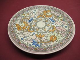 Charlotte Rhead for Crown Ducal, 1930's circular wall plaque, floral decoration, and polichrome