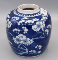 Late Quing Chinese blue and white prunus decorated ginger jar, Kangxi mark, lacking cover, H14cm