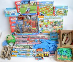 Collection of mostly Thomas & Friends battery operated plastic model train sets from Tomy and Takara