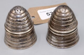 C20th Silver salt and pepper shakers, with beehive graduated design, Birmingham, 1992, Barrowclift