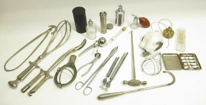 Collection of medical and surgical instruments inc. scalpels, cased syringe set, forceps, etc.