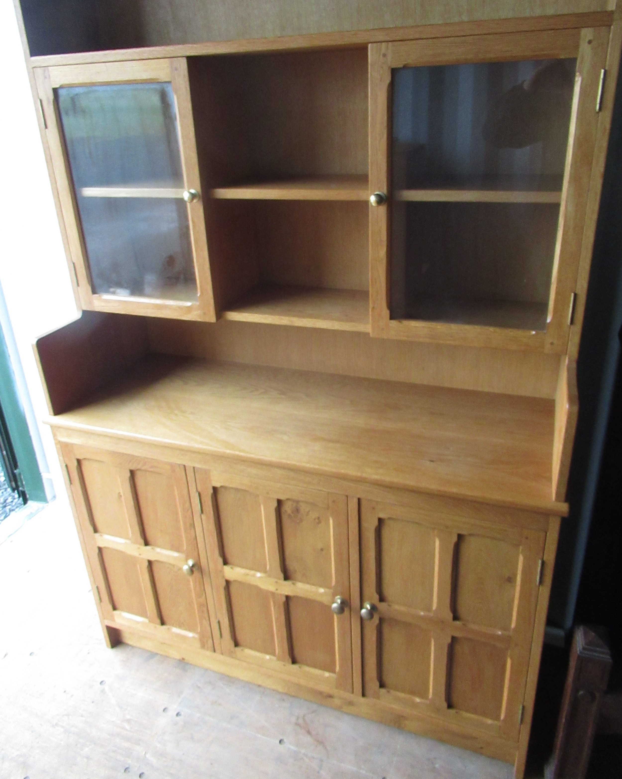 Yorkshire oak style light oak dresser, raised three shelf back with two glazed doors, the base