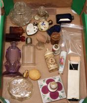 Collection of scent bottles incl. porcelain examples, a leather cased smelling salt bottle, and