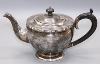 Art deco silver tea pot, with a circular base and bakelite handle, Birmingham, 1924, J Collyer