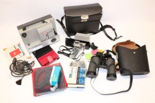 Nintendo DS in red; Eumig Mark 501 projector; Bolex 150 Super 8mm cine camera; and a pair of Swift
