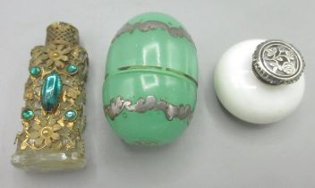 Three C19th continental scent bottles, comprising a green opaline glass egg form scent bottle with