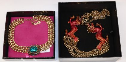 Two Butler and Wilson statement chain link necklaces, one with enamel dragon design, and another