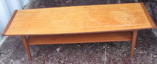 Mid century teak two tier rectangular coffee table on square tapered supports , W115cm D36cm