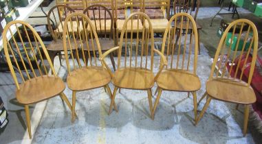 Set of five arched stick back dining chairs, on splayed supports, including one armchair, some