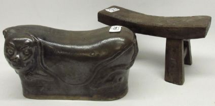 Chinese stoneware head rest modelled as a reclining cat, and a similar wooden head rest, max.