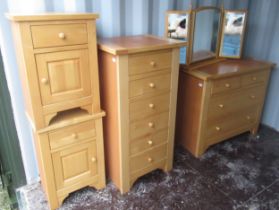 Suite of modern light wood bedroom furniture comprising of kneehole dressing table with triple