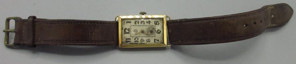 Roskopf 1930's 18K gold wristwatch, signed silvered dial with applied gold tone Arabic hours with