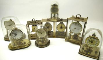 Kundo C20th brass four glass 400 day suspension timepiece H23cm eight other similar clocks by