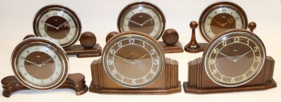 Metamec Dereham mains electric mahogany mantle clock with chrome plated bezel and silvered chapter