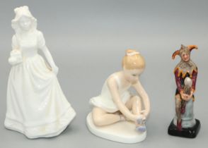 Royal Doulton figures: The Jester HN3335 H9.5cm, Ballet Shoes HN3434 H9.5cm, and a figure of a