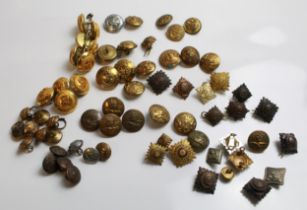 Quantity of military brass buttons and pips