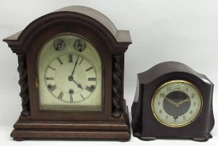 Kienzle C20th oak Westminster chiming mantel clock with barley twist columns and silvered dial,
