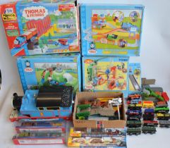 Collection of Thomas & Friends battery operated plastic model train sets from Tomy and Takara Tomy