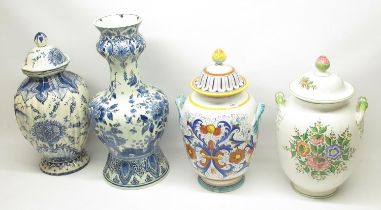 Two large Deruta Italian pottery painted ceramic jars and covers; large painted Delft jar and cover;