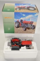 Boxed Universal Hobbies 1/16 scale diecast Massey Ferguson 135 tractor model in mint condition,