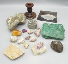 Mixed collection of rocks and minerals inc. amethyst, a small red stone candlestick, etc.