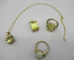 9ct yellow gold pendant necklace set with green stone with cross detail, a matching ring, size O,