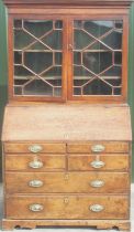 George 111 Country made oak bureau bookcase, with moulded cornice and astragal glazed doors above