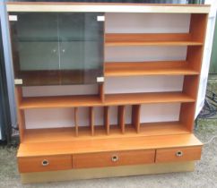 1970s wall unit, with two smoked glass doors and shelves with record storage on a three drawer