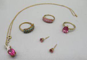 9ct yellow gold ring set with pink topaz, size O, a 9ct gold necklace, the pendant set with pink