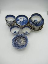 Set of nine late C18th/ early C19th English blue and white Willow pattern tea bowls and saucers with