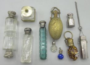 Collection of scent bottles, incl. an egg form pendant bottle with painted enamel decoration, two