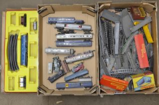 Selection of OO gauge Hornby Tri-ang railway track and train carriages, etc