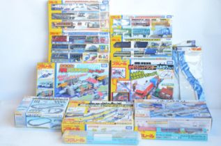 Collection of boxed Japanese Imported Takara Tomy/PlaRail battery operated plastic model train