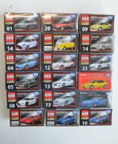 Eighteen boxed diecast Premium series model cars from Takara Tomy, all Japanese imports to include