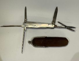 Mother of pearl handled ladies manicure knife with scissors, file, toothpick and two blades by