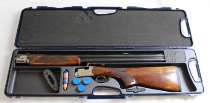 Cased 12B Beretta 686E over/under multi choke single trigger shotgun. Barrel length 30ins, length of