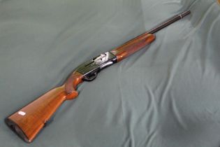 12B Breda semi-auto shotgun with 27" barrel, overall length 48" with choke, vented barrel (11),