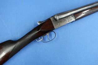 AYA 12 bore side by side double trigger ejector shotgun with 27 3/4 inch barrels and 14 3/4 inch