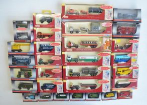 Thirty boxed 1/76 scale OO gauge diecast Trackside model vehicles/vehicle sets from Corgi and