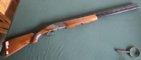 12B Rizzini over under multichoke single trigger ejector shotgun with 27" vented (18)barrels,