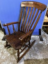 Early C20th ash and elm slat back kitchen Windsor rocking chair, seat stamped JM (1920)Ltd.