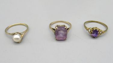 9ct yellow gold ring set with single pearl, size L, a 9ct ring set with purple stone, size P, and